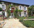 GRAND MANOR: Located in the centre of a village, this 17th-century manoir has an apartment, outbuildings, heated pool and spacious garden.