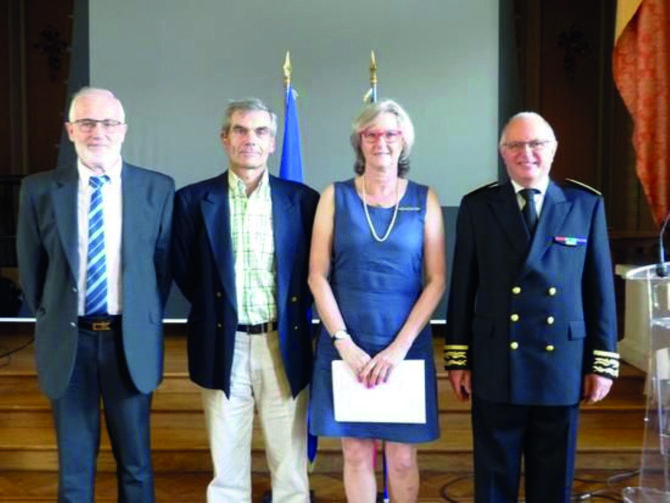 When Keni and husband received their certificates, their then Maire, M. Alan Perche, the Prefect with Chris and Keni in the centre